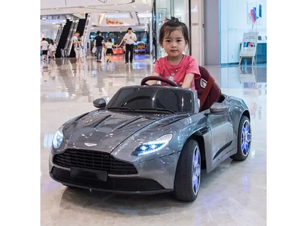 ბავშვის ელექტრო მანქანა ASTON MARTIN DB11 კაუჩუკის საბურავებით და ტყავის სკამით, 7 image